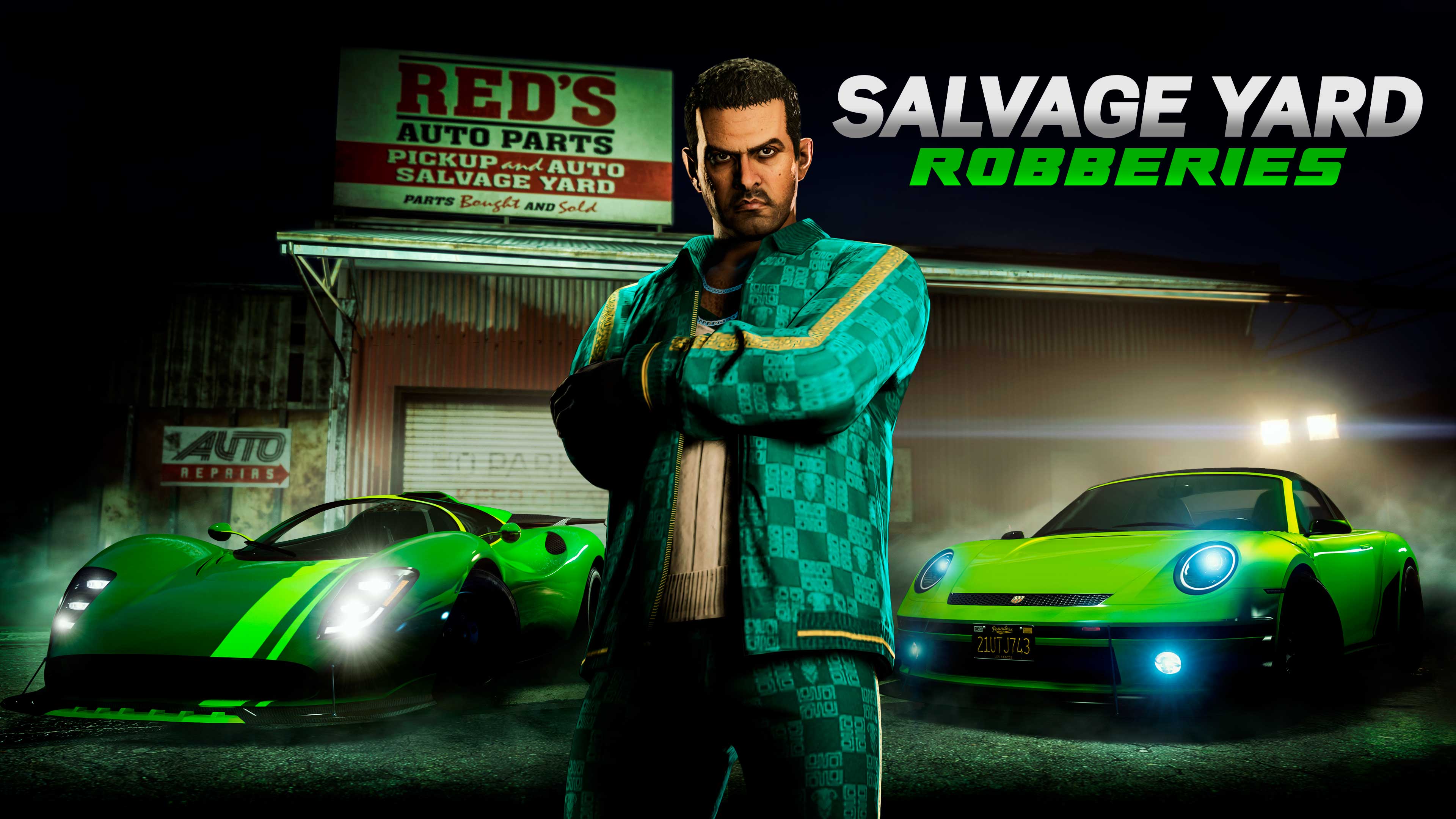 Salvage Yard Robberies poster featuring Jamal standing with crossed arms outside Red’s Auto Parts in front of two green modified cars. 