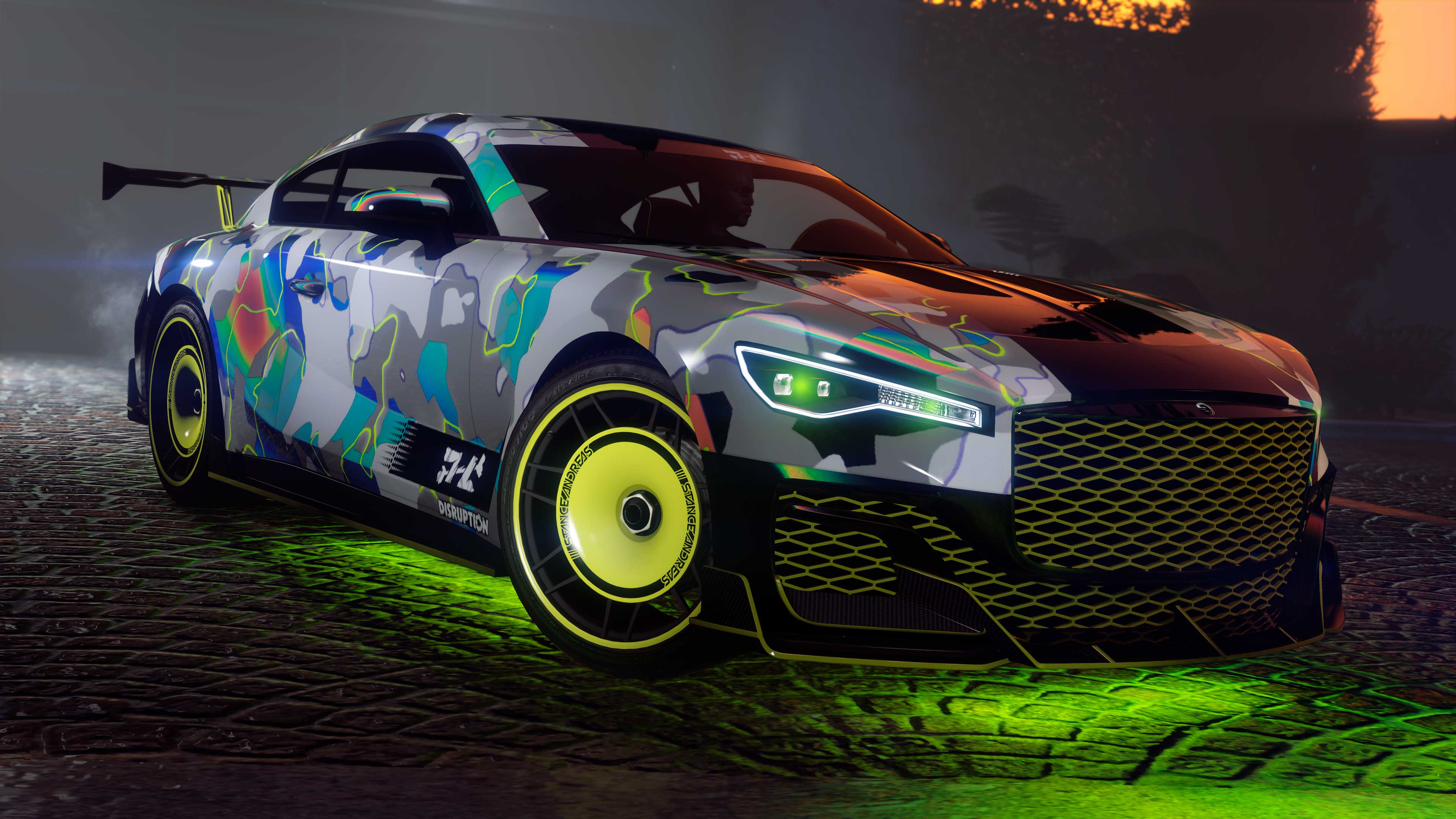 An Enus Paragon S with a 76 Camo livery and green under glow drives along stone paved ground.