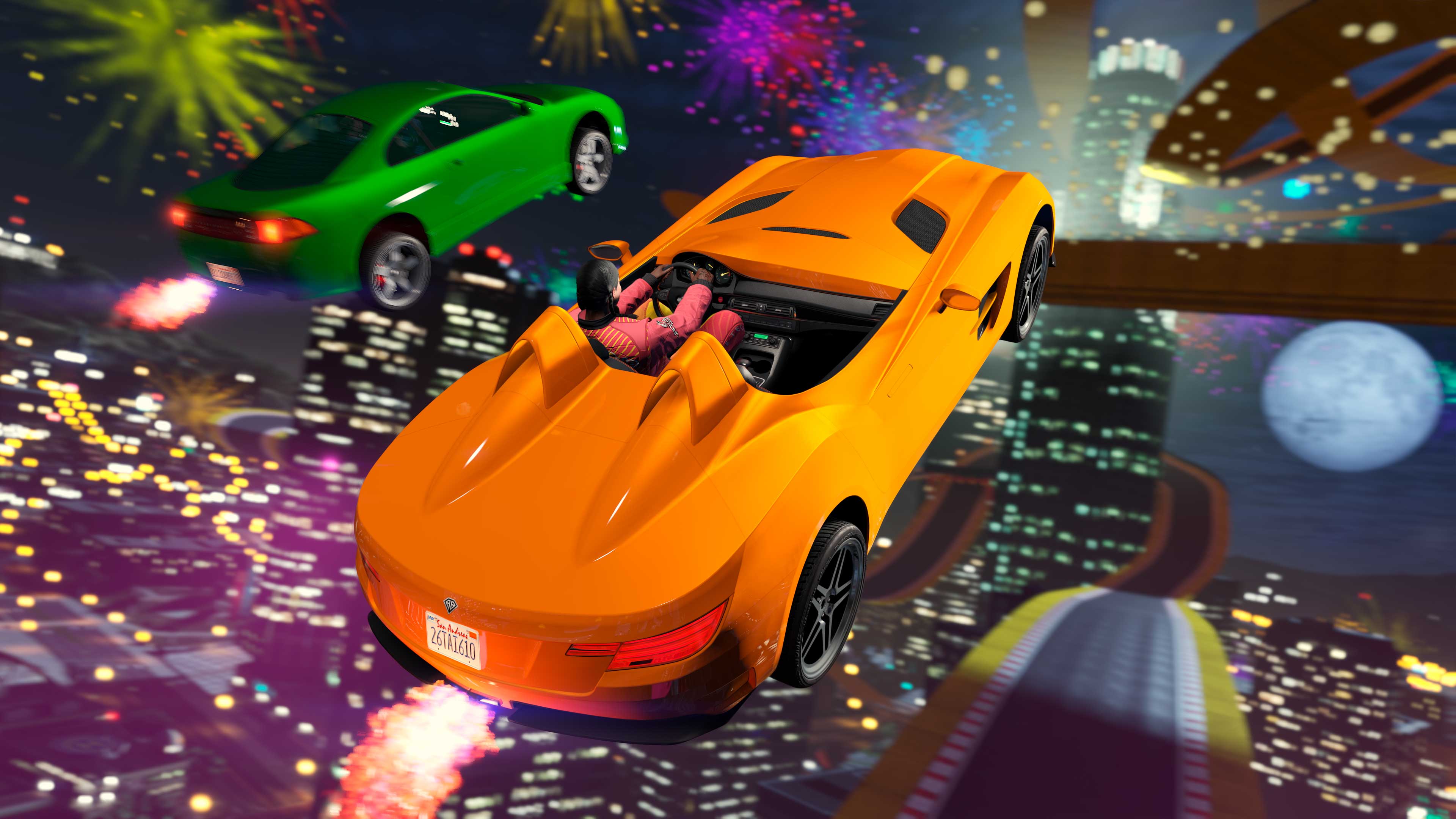 Cars in a stunt race use nitrous to soar through fireworks over the city at night. 