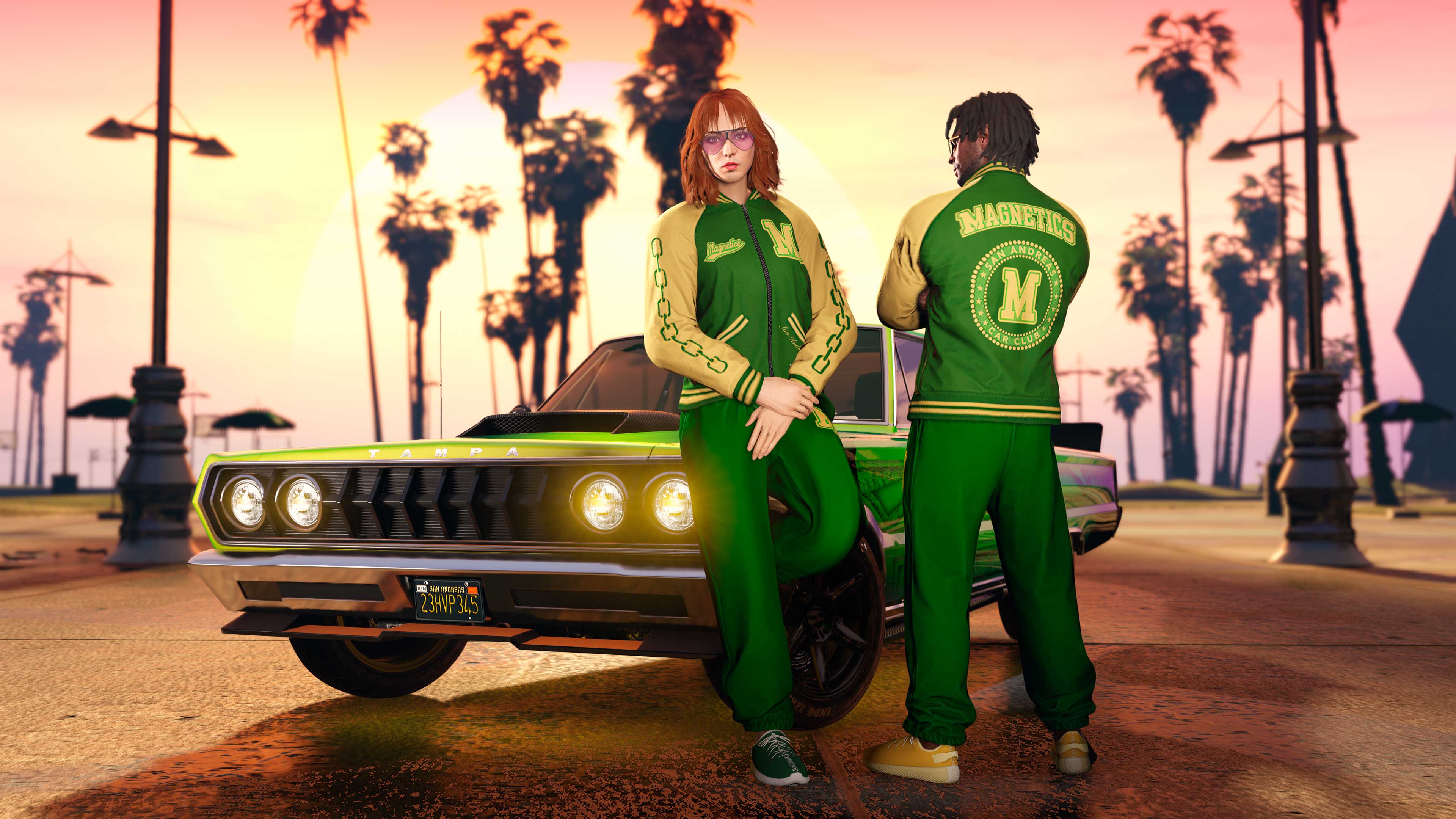 Two characters wearing the  Magnetics Bomber Zipped Jacket and Track Pants as they stand next to a green lowrider, at sunset, near the beach. 