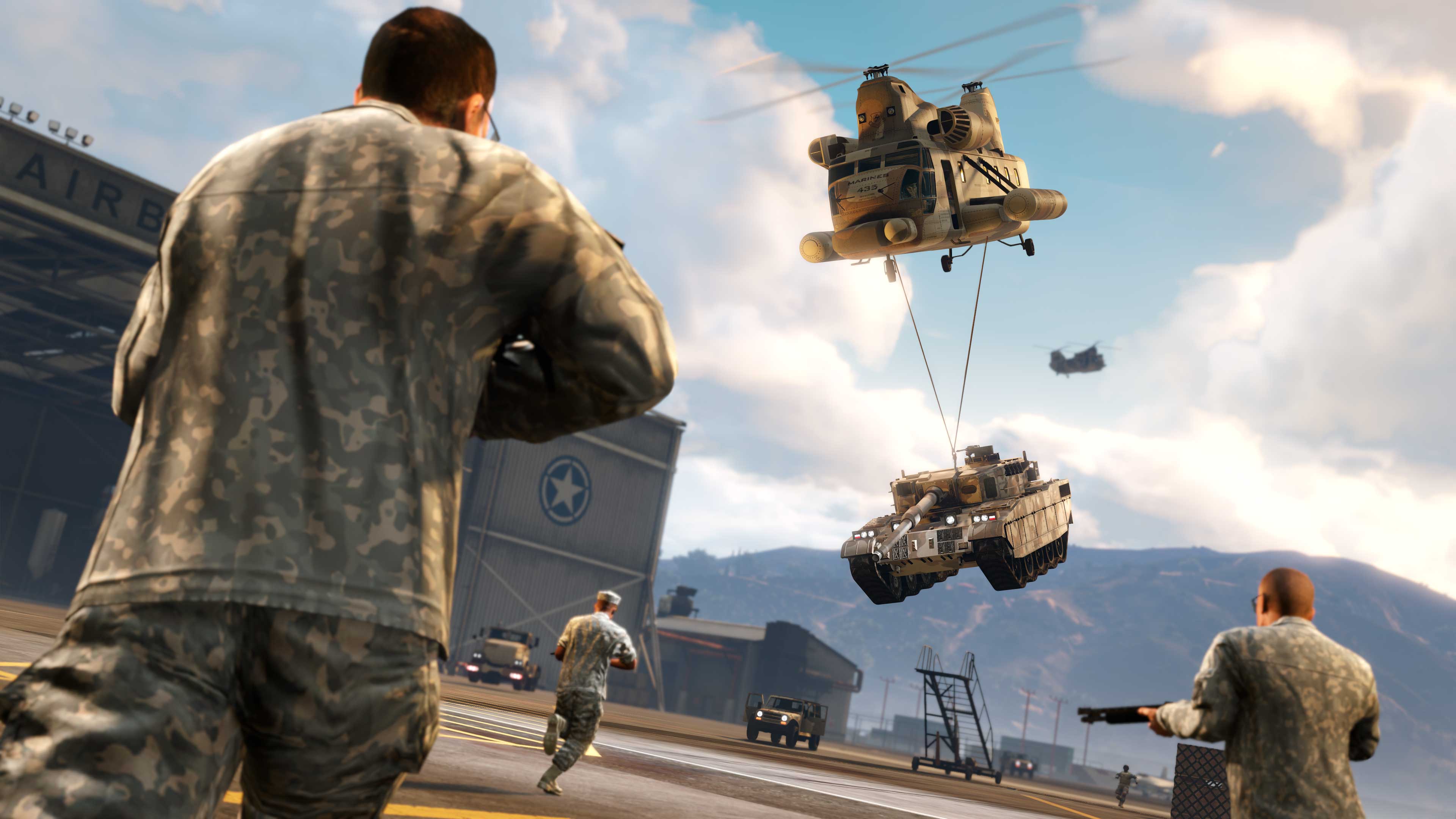 Armed military characters run towards a helicopter lowering a tank into an air base.