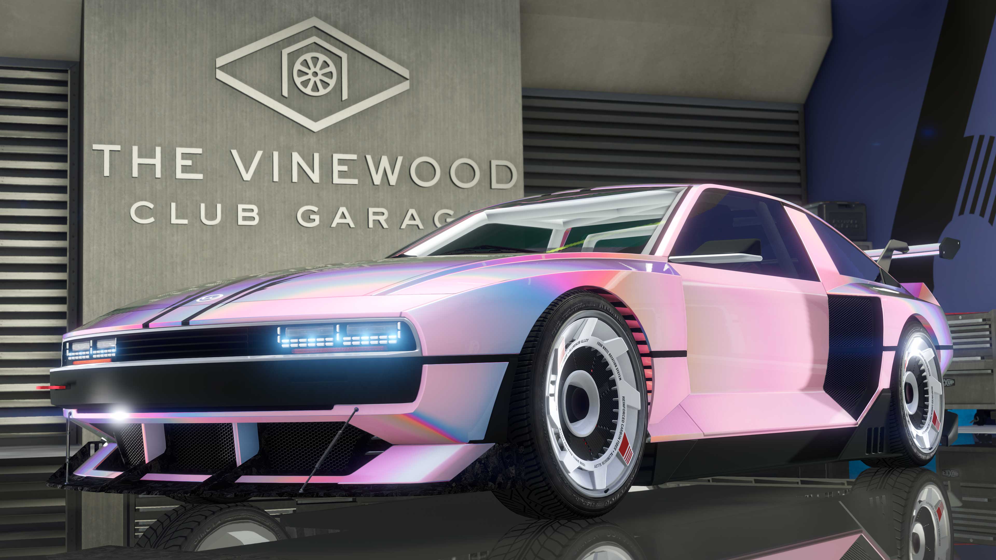A three-door Bollokan Envisage with bright Chameleon paint parked inside The Vinewood Club Garage.