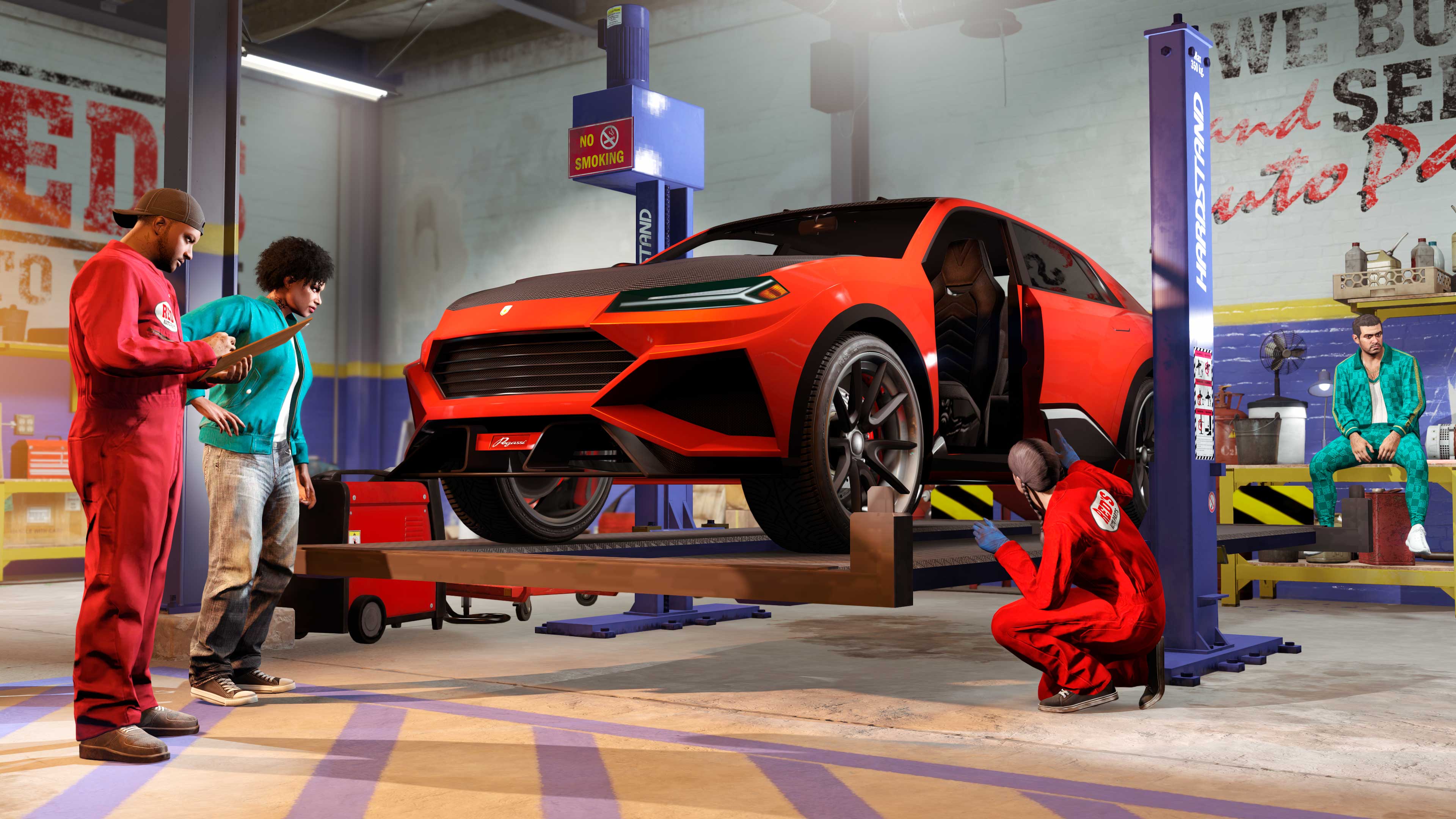 Mechanics at Red’s Garage working on a Pegassi Toros.
