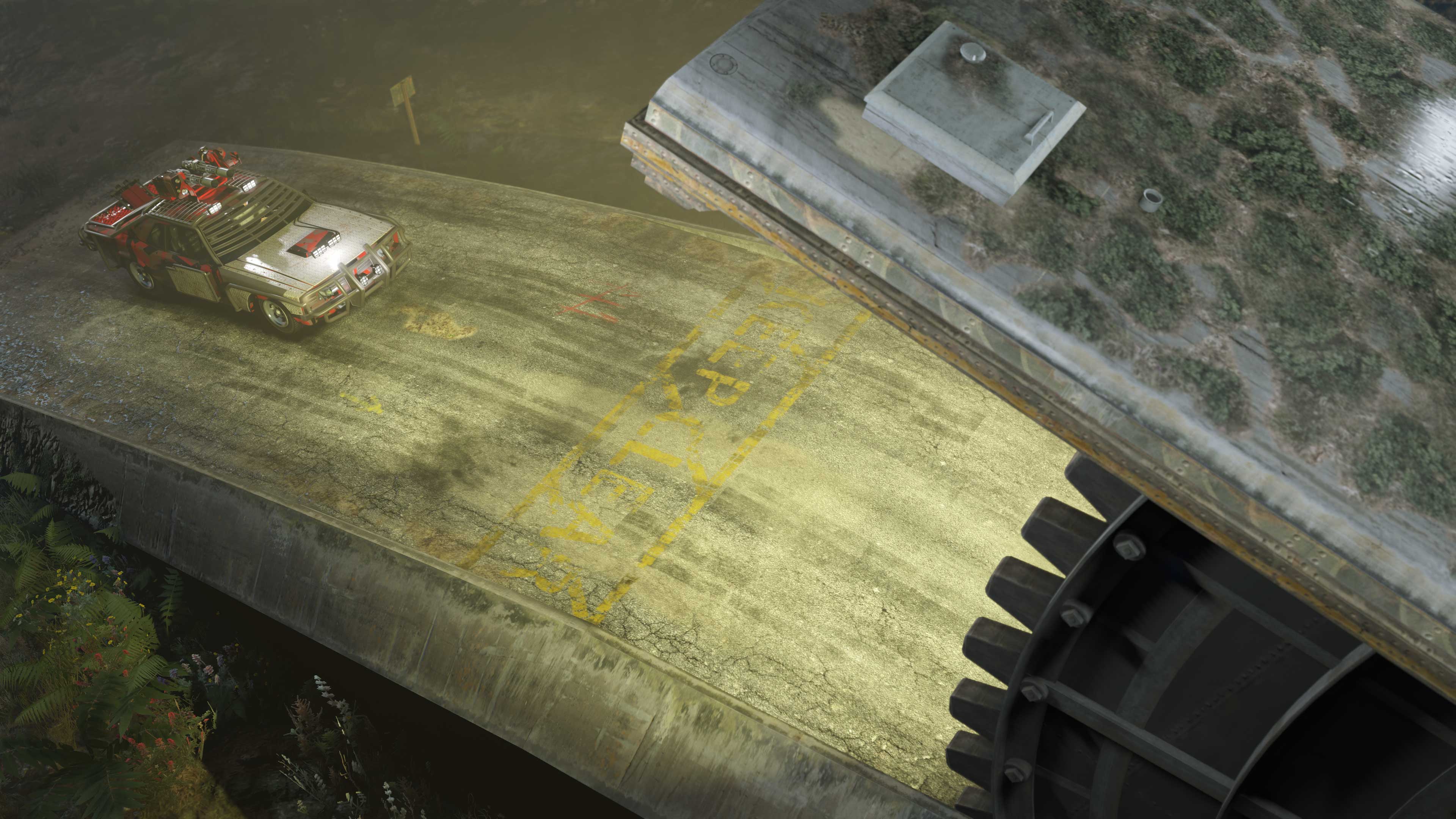 A modified and weaponized car heads towards a bunker.