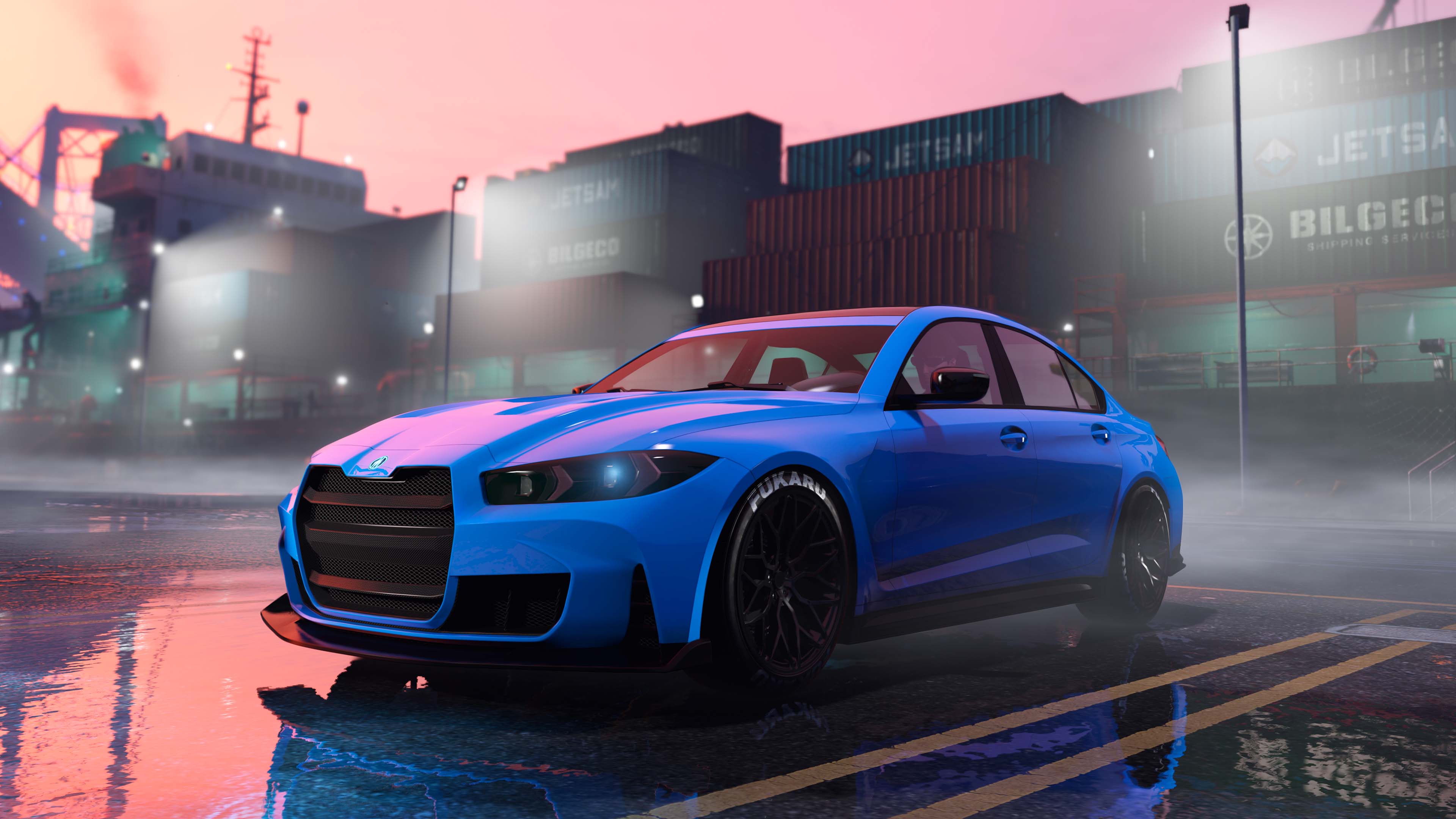 A blue, four-door Übermacht Sentinel GTS near a container ship surrounded by fog. 