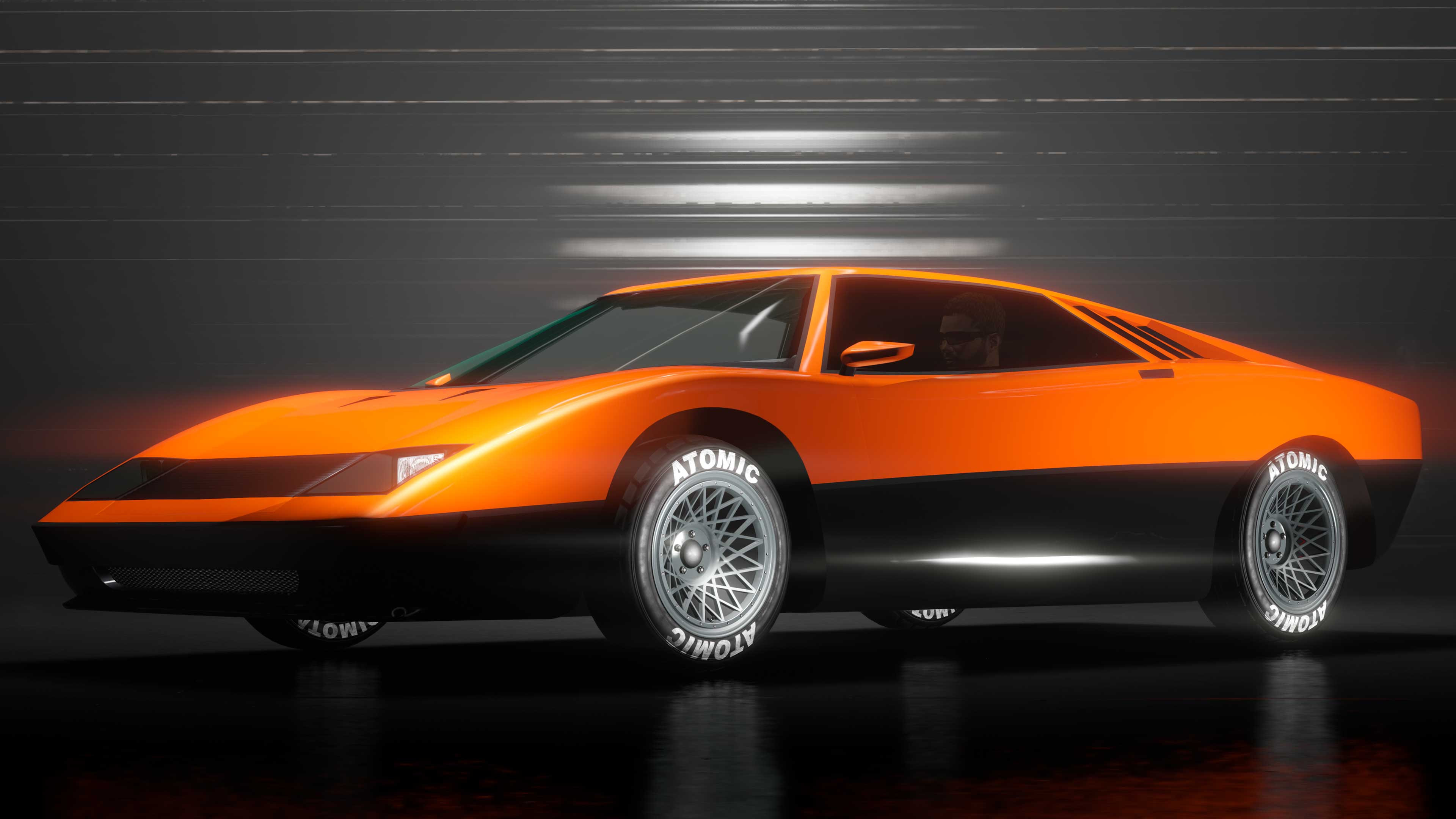 A two-door Ocelot Stromberg car with an orange top half and a black bottom half. 