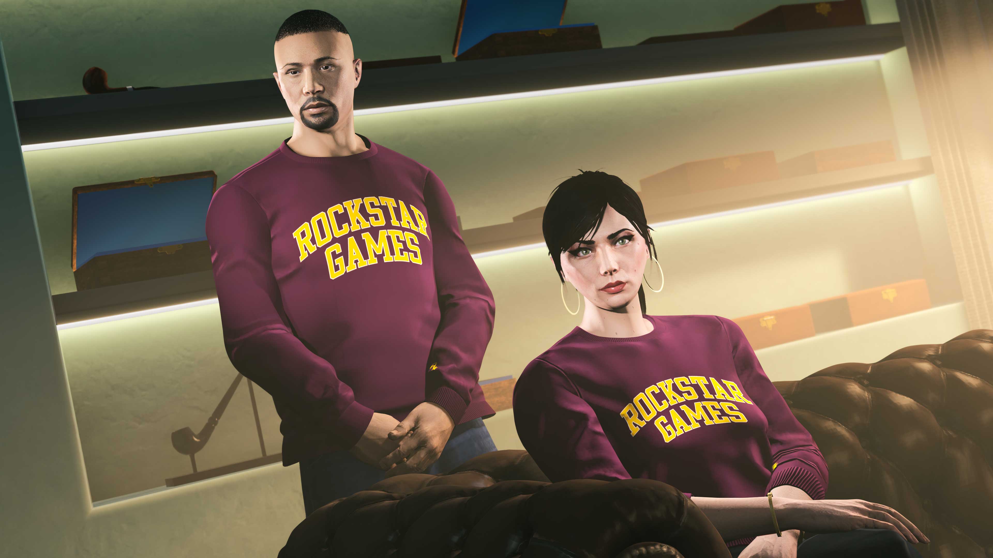 Two GTA Online characters pose wearing the Burgundy Rockstar Varsity Crewneck. 