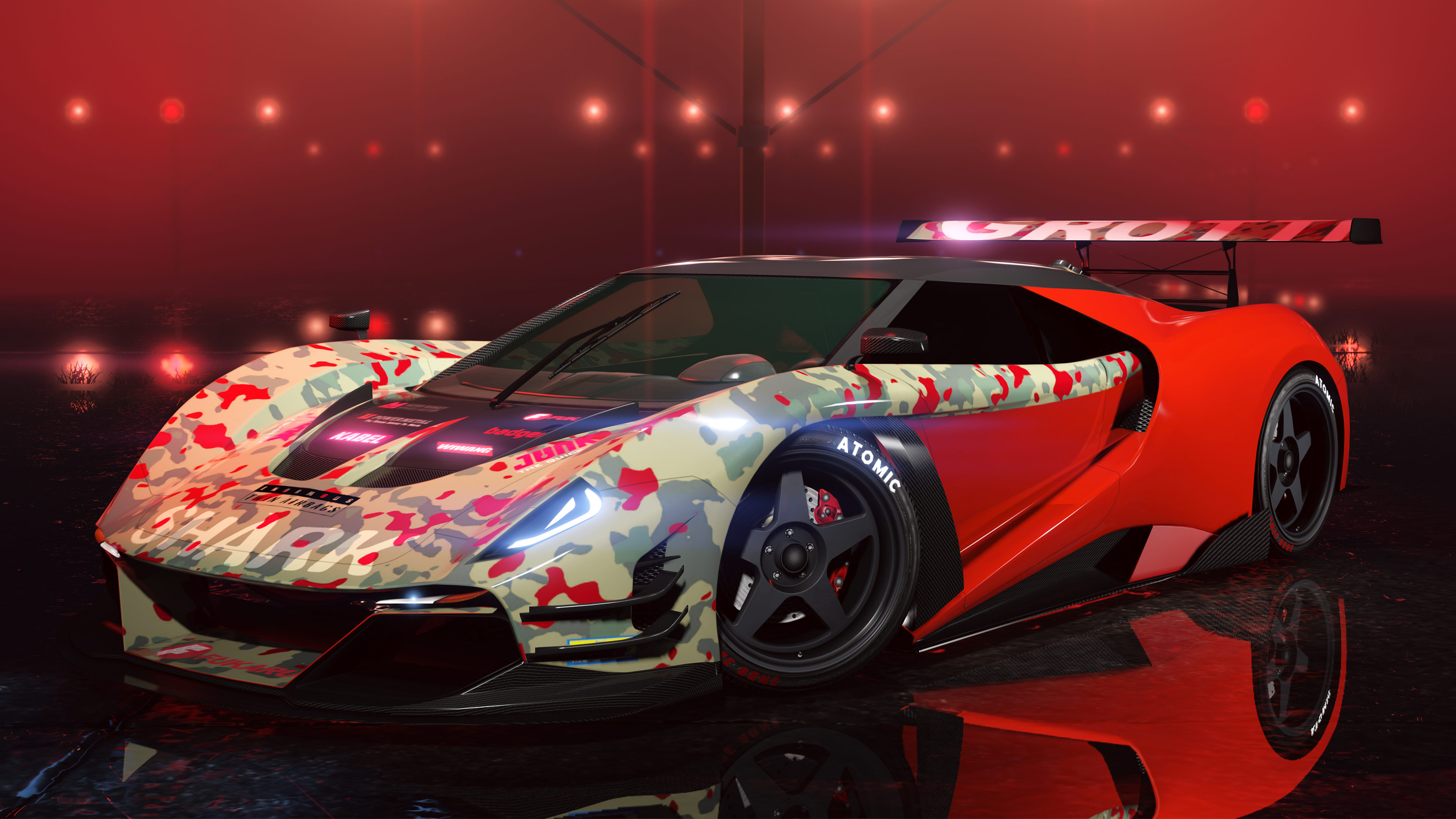 A Grotti Veleno GT on a glossy podium under red and white lights. 