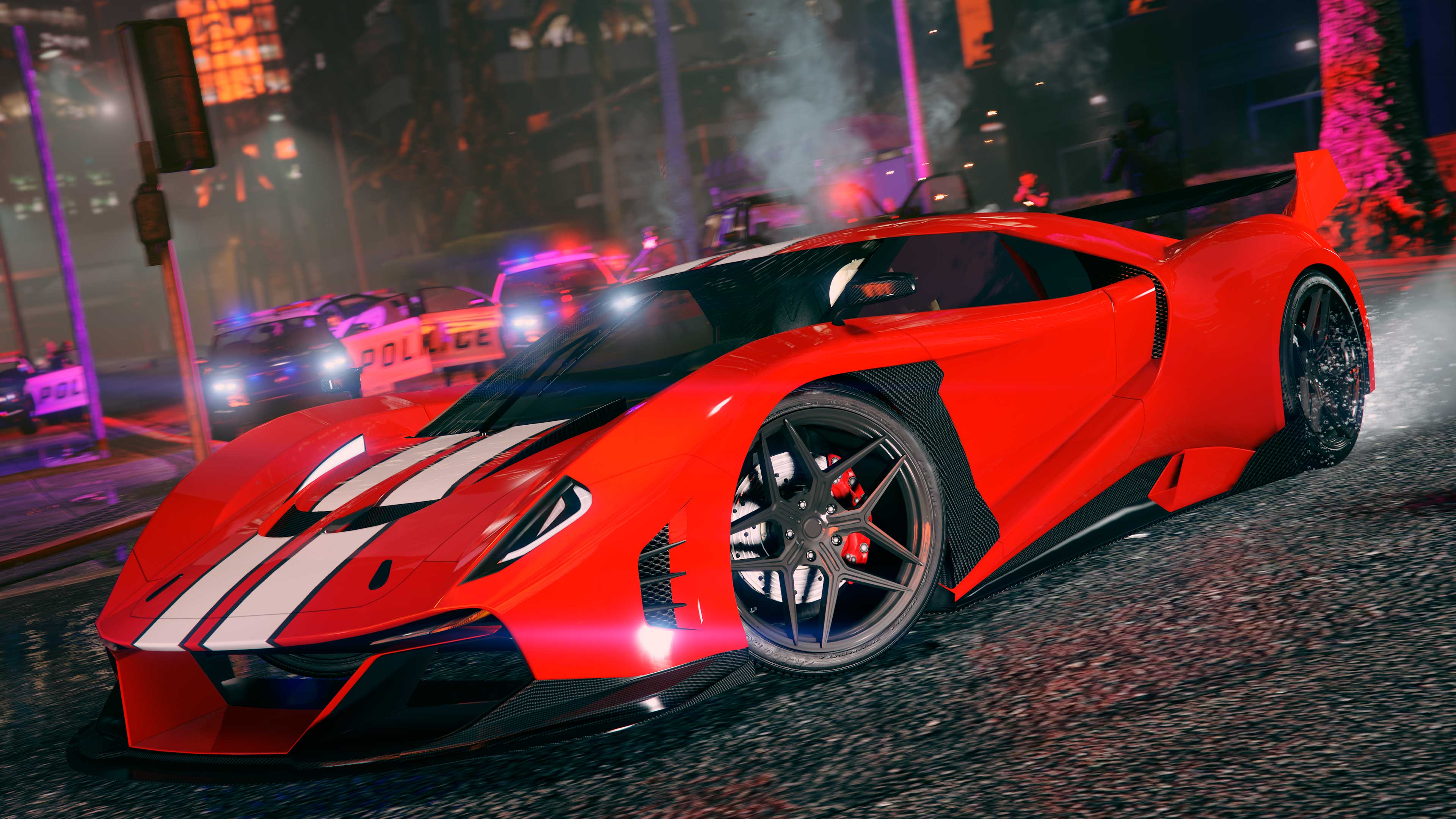 A red Grotti Veleno GT car speeding away from pursuing police cars. 