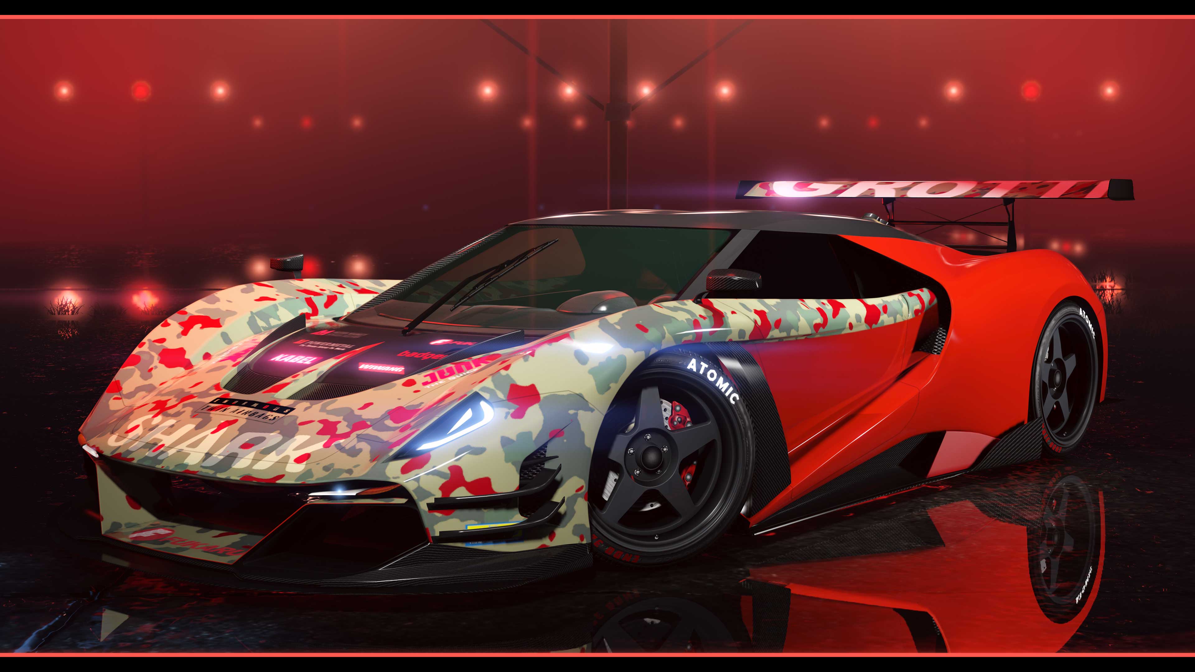 A Grotti Veleno GT on a glossy podium under red and white lights. 